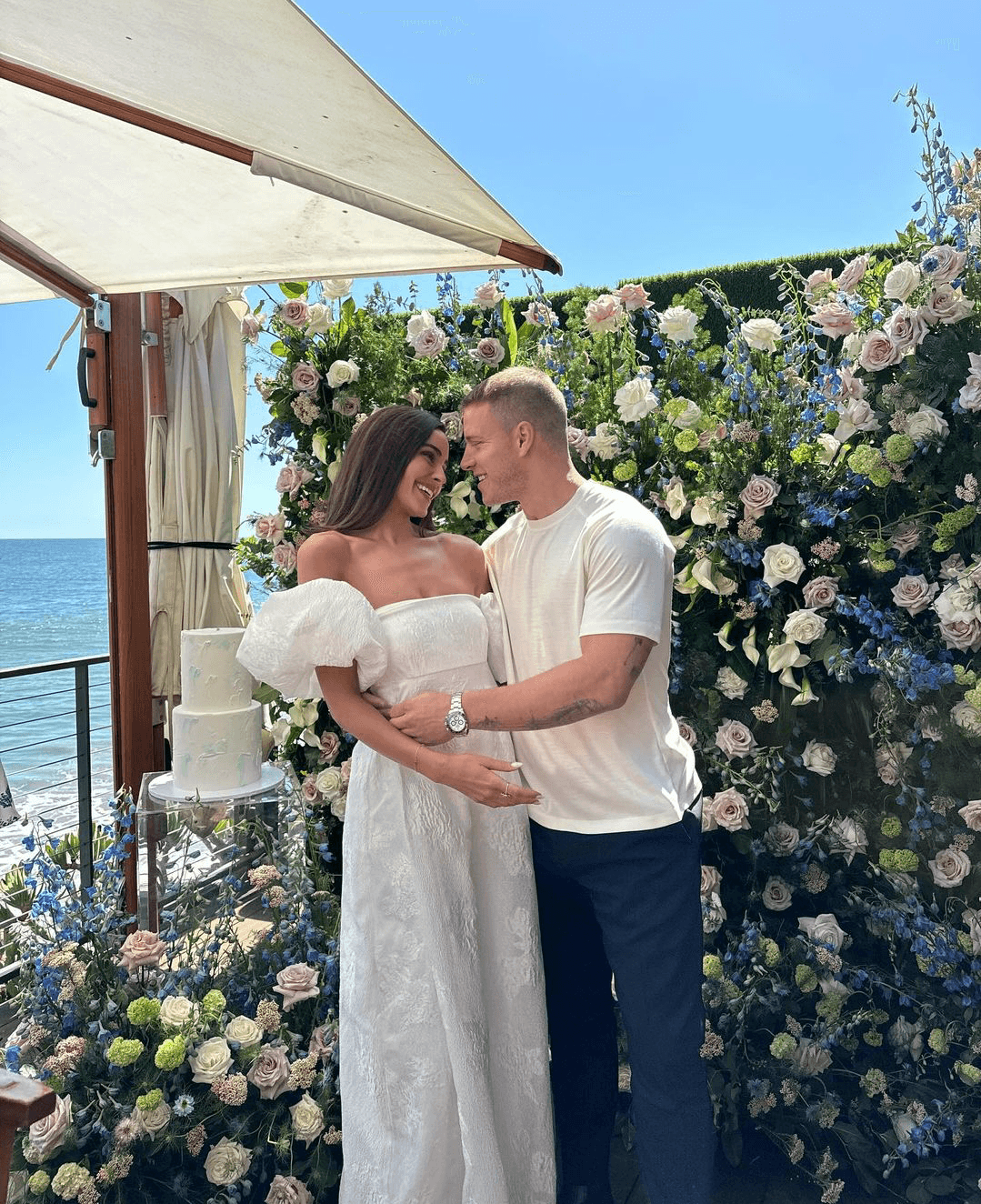 Christian and Olivia together posing for Bridal Shower | Source: oliviaculpo 