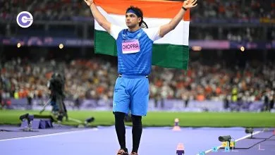 Neeraj Chopra celebrates his silver medal win at the Paris Olympics 2024, showcasing his impressive javelin throw performance.