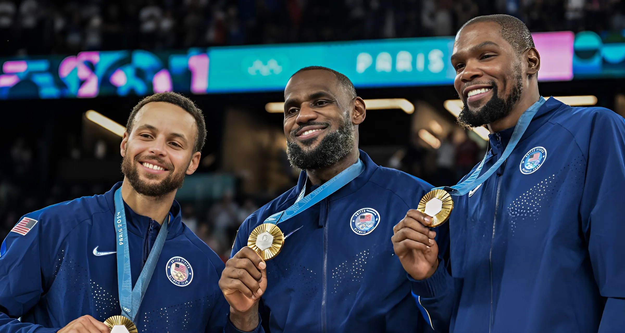 Gold medallists Stephen Curry, LeBron James and Kevin Durant pose after the men's Gold Medal win